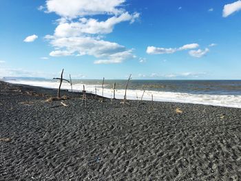 Scenic view of beach against sky