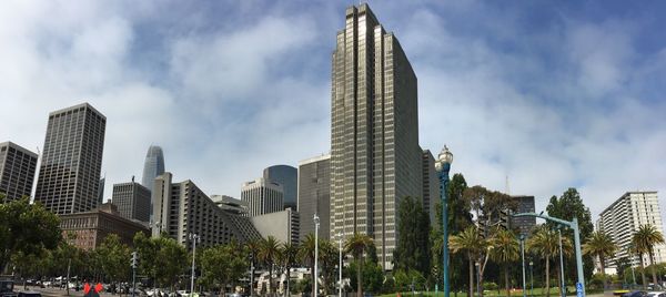 Low angle view of modern buildings against sky