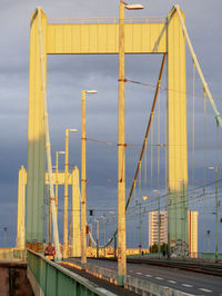 Bridge against sky in city