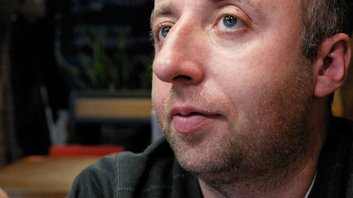 Close-up of young man looking away