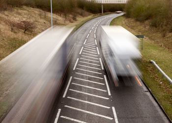 Blurred motion of vehicles on road