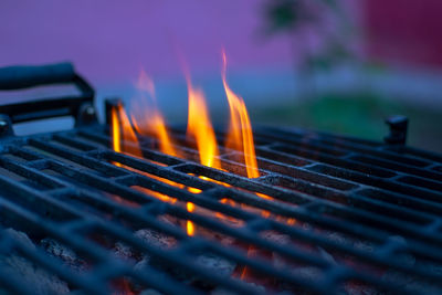 Close-up of fire in barbecue grill