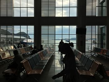 People sitting on chair at airport