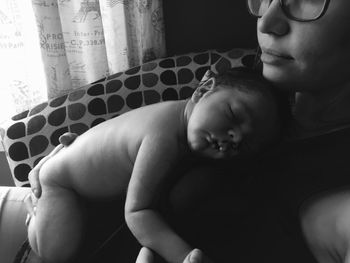 Mother and baby girl at home