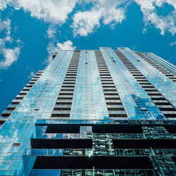 Low angle view of modern building against sky