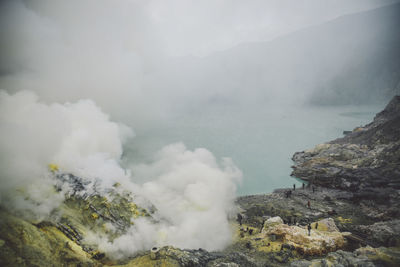 High angle view of landscape amidst smoke