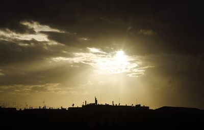 Silhouette of building against sky