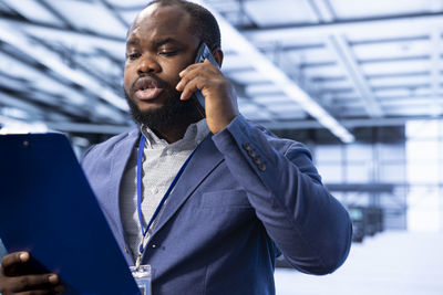 Young man using mobile phone