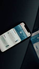 High angle view of smart phone on table
