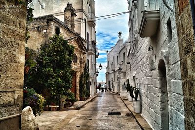 Narrow alley along buildings