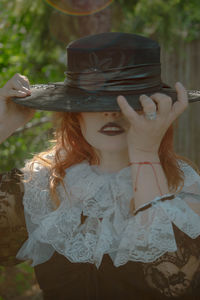 Rear view of woman wearing hat