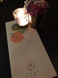 High angle view of illuminated flower vase on table