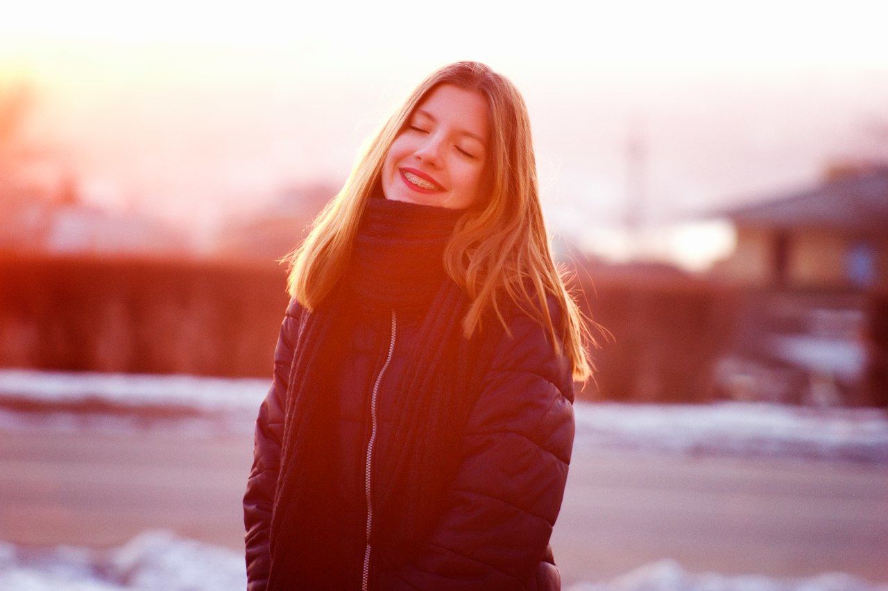 beauty, winter, beautiful people, sunlight, long hair, young adult, females, red, smiling, young women, beautiful woman, one person, enjoyment, sunset, people, happiness, women, outdoors, cold temperature, only women, adult, snow, warm clothing, nature, adults only, sky, one young woman only, beauty in nature, charming, human body part, day