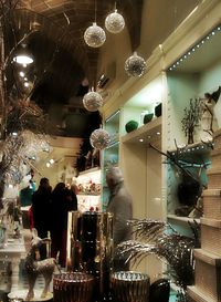 Illuminated lamp post in dark room