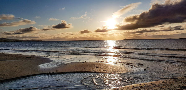 Scenic view of sea against sky during sunset