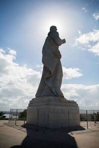 Statue against sky