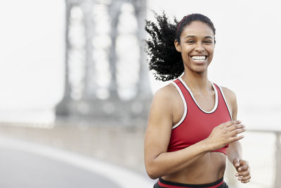 Smiling woman running