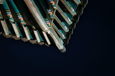 High angle view of pipes against black background