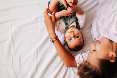 High angle view of mother and daughter at home