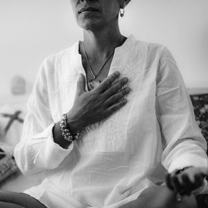 Self-healing heart chakra meditation. woman sitting in a lotus position