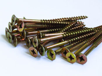 High angle view of objects on table against white background