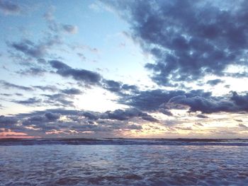 Scenic view of sea against sky at sunset