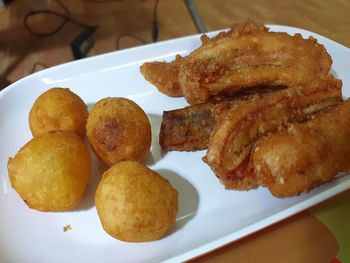 High angle view of bread in plate on table