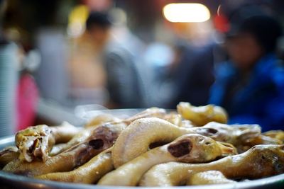 Close-up of cooked duck in container