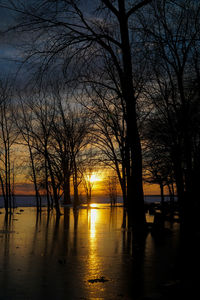 Scenic view of sunset over river