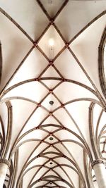 Low angle view of illuminated ceiling of building