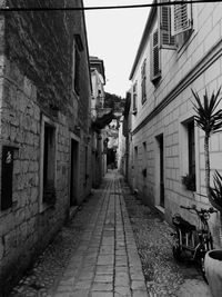 Narrow alley along buildings