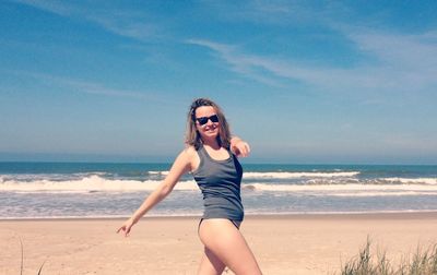 Portrait of young woman on beach