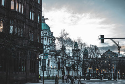 Street amidst buildings against sky