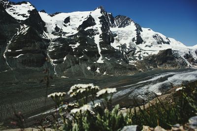 Scenic view of snow covered mountains