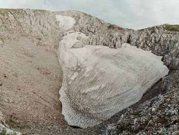 High angle view of rocks on land against sky