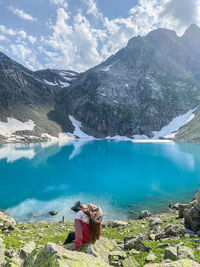 Panoramic view of lake and mountains against sky