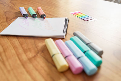 High angle view of colored pencils on table