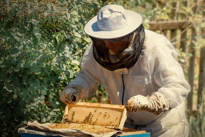 Man working on plants