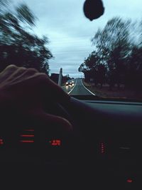 Road seen through car windshield