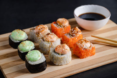 Close-up of sushi on cutting board