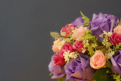 Close-up of rose bouquet against black background