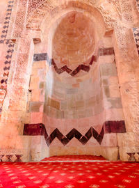 Low angle view of carvings on wall of building