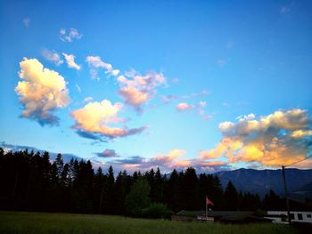 Scenic view of field against sky during sunset