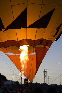 Low angle view of hot air balloon against morning sky