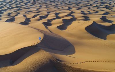 High angle view of sand dunes at beach