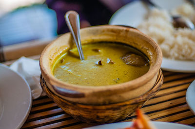 Close-up of gravy served on table