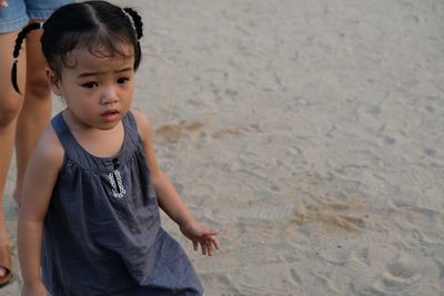 Boy girl on sand
