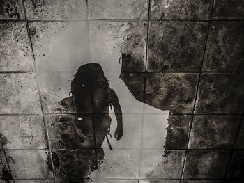 Close-up of man standing in city