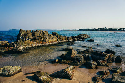 Scenic view of sea against clear sky