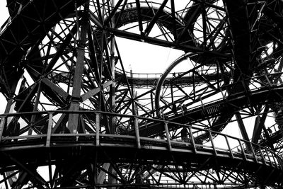 Low angle view of metal structure against sky